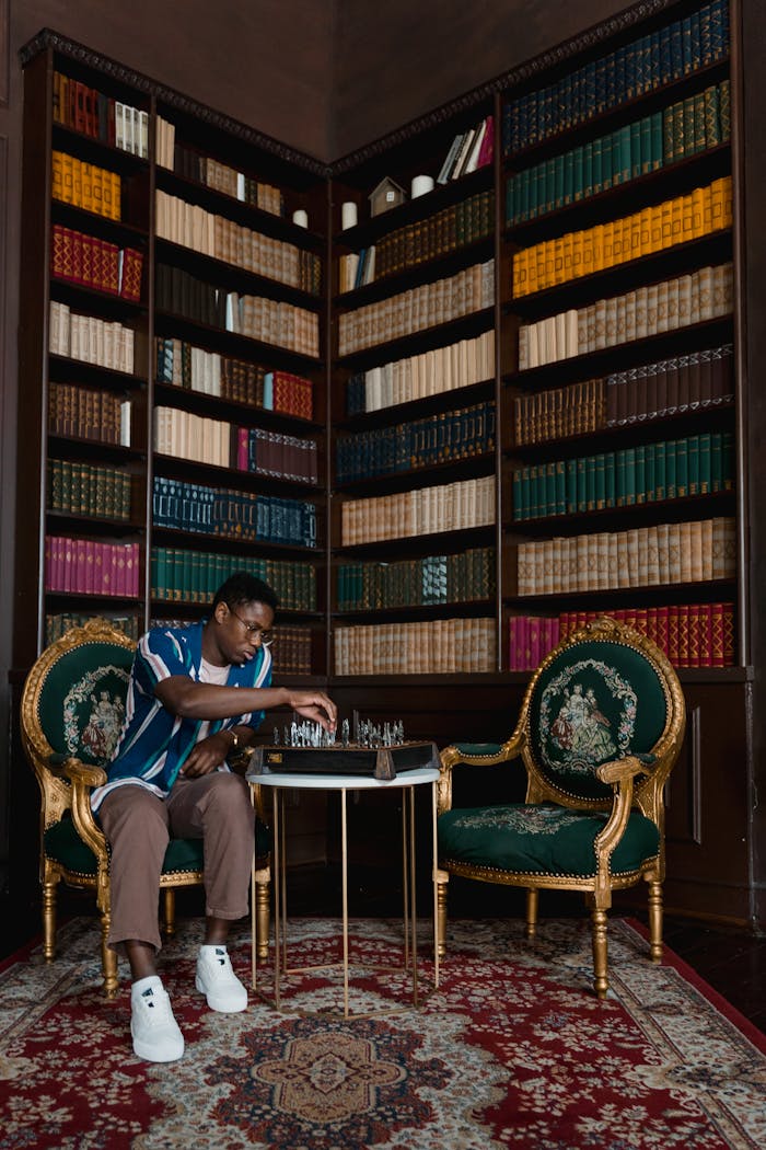 A Man Playing Chess Alone